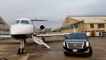 Private jet and cadillac escalade